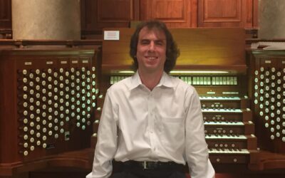 Organist Aaron Comins on June 27